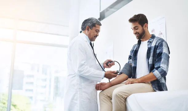 Compassionate healthcare professional assisting patient during hospital visit